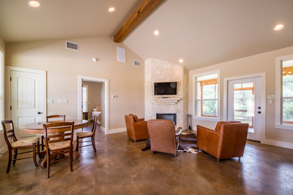Living Room with Fireplace at Creek Lodge, Pipe Creek Texas