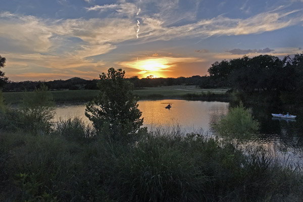 Kayaking at Sunset while vacationing at Rancho Madrono near Boerne, Texas